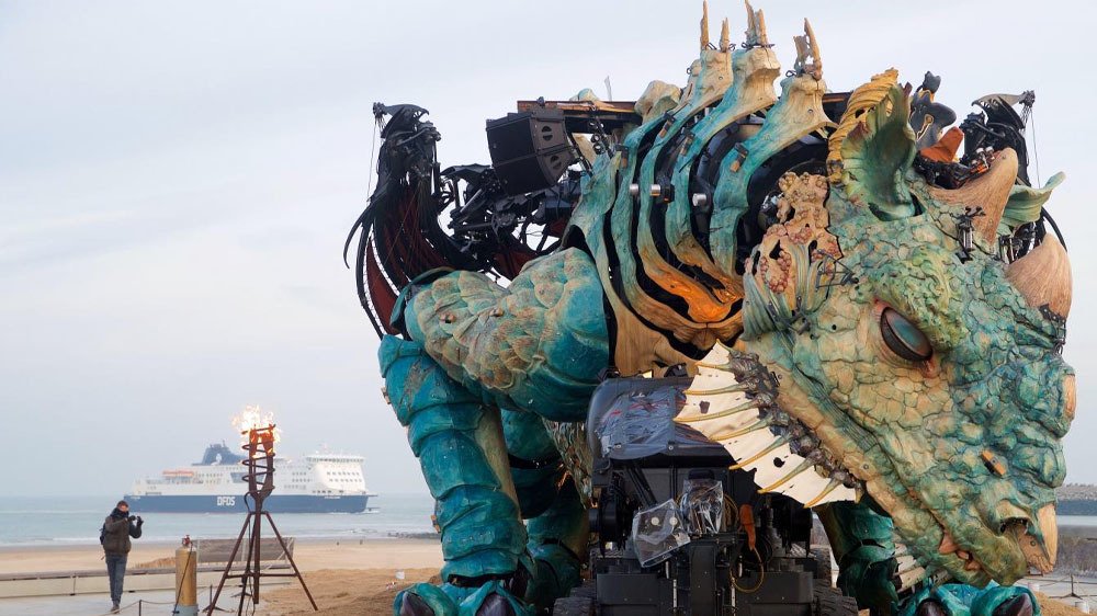 An Enormous Smoke-Spewing Dragon Roves the Streets of Calais, France