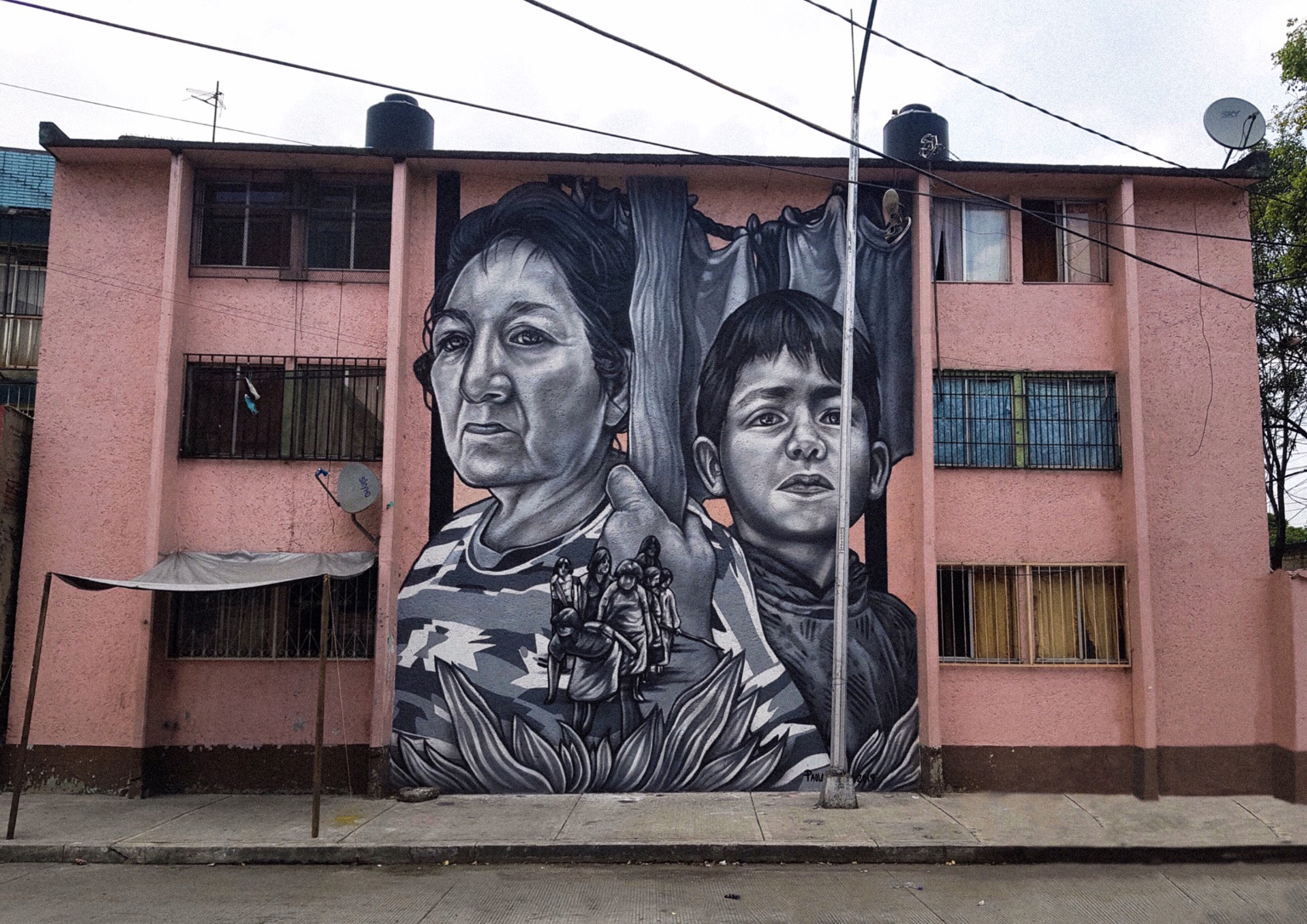 Illustrative Murals in Shades of Grey by Paola Delfín Characterize Human Bonds