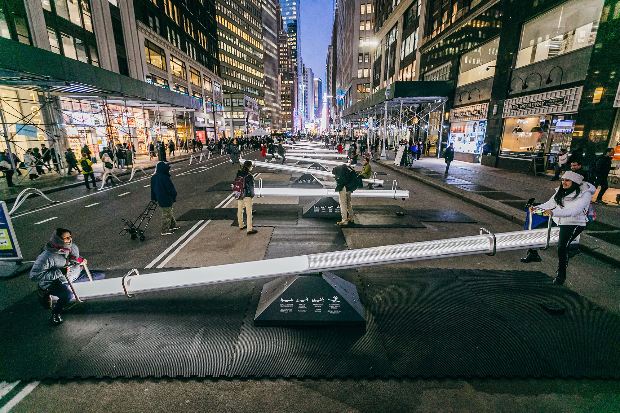 Giant Seesaws Transform New York City’s Garment District into Light-Filled Urban Playground