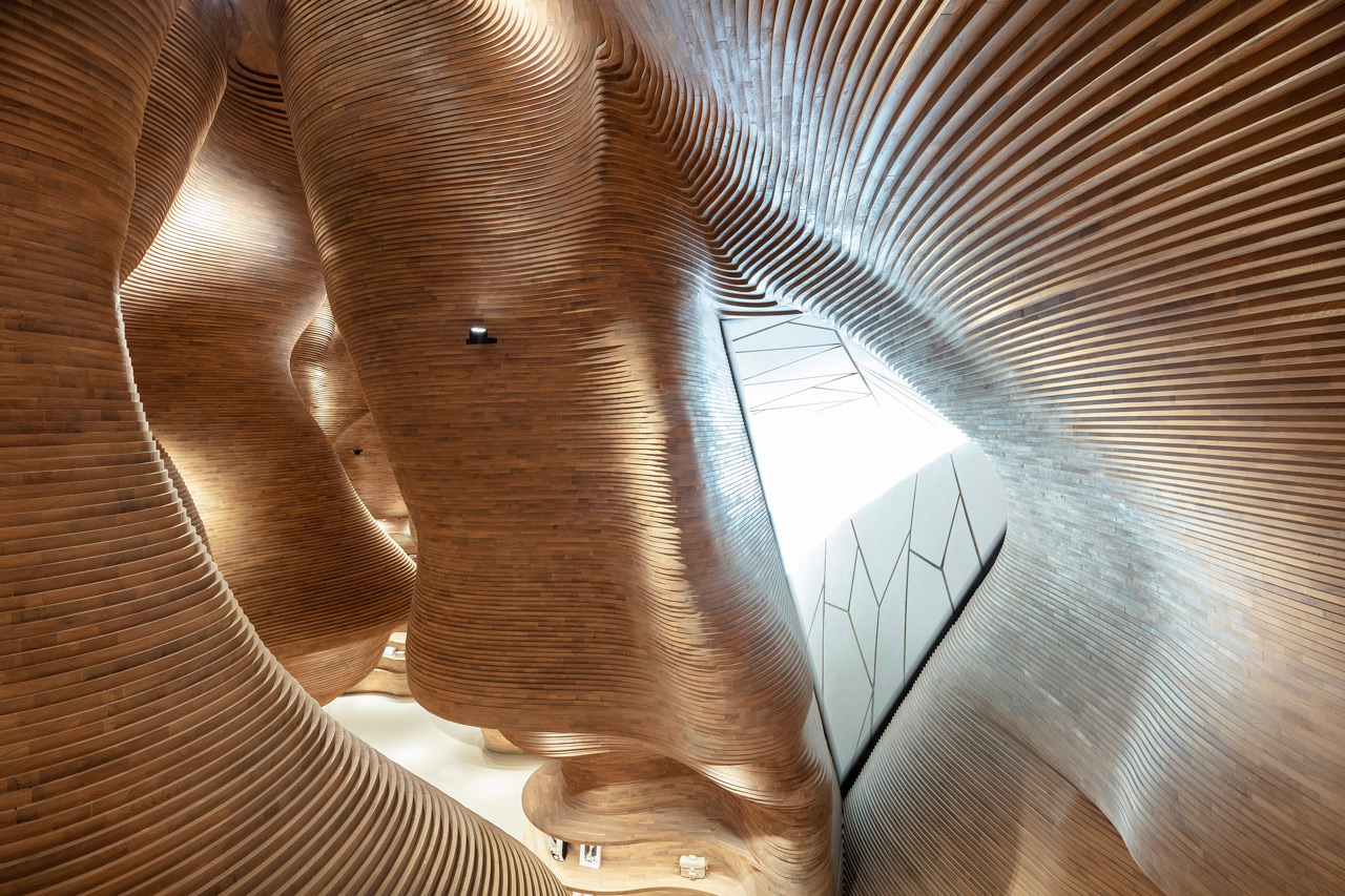 A Geological Landmark’s Phosphorescent Glow Inspires the National Museum of Qatar’s Cavernous Gift Shop