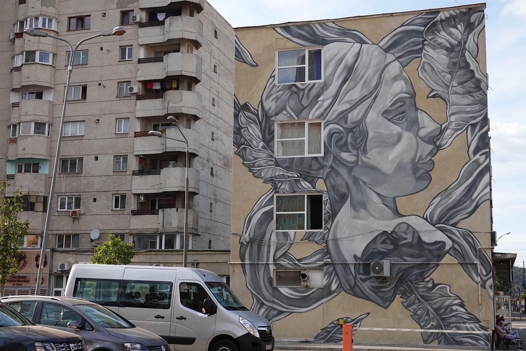 Illustrative Murals in Shades of Grey by Paola Delfín Characterize Human Bonds