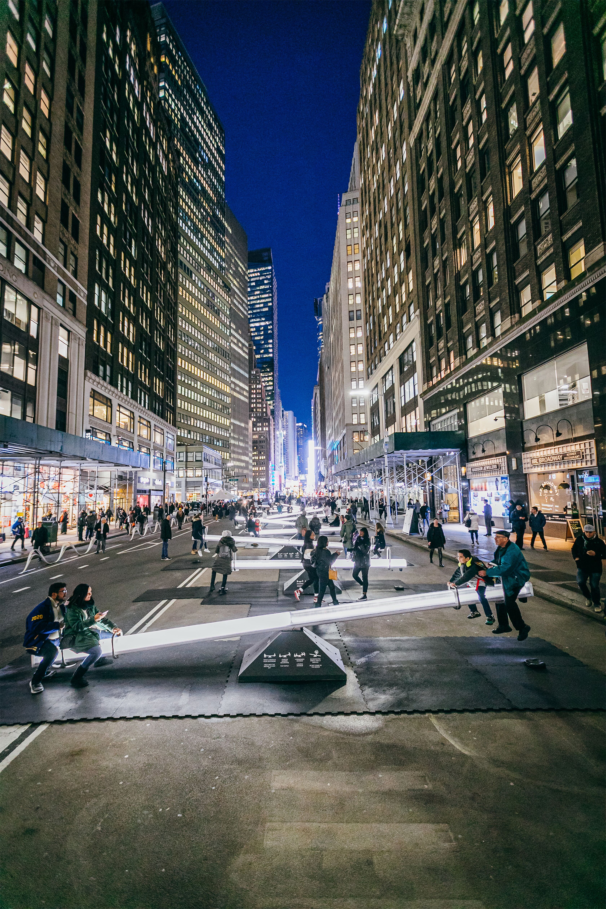 Giant Seesaws Transform New York City』s Garment District into Light-Filled Urban Playground