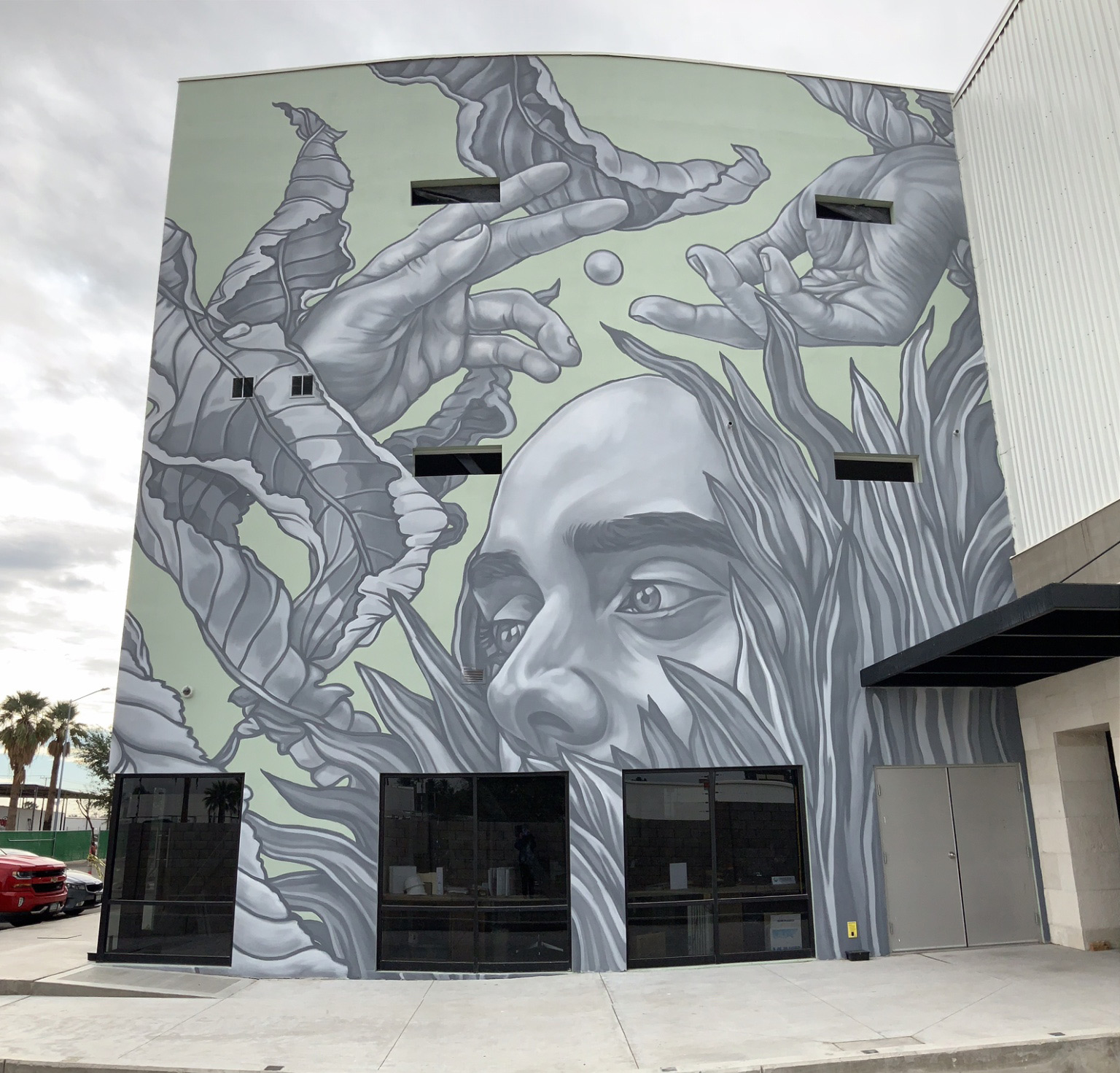 Illustrative Murals in Shades of Grey by Paola Delfín Characterize Human Bonds