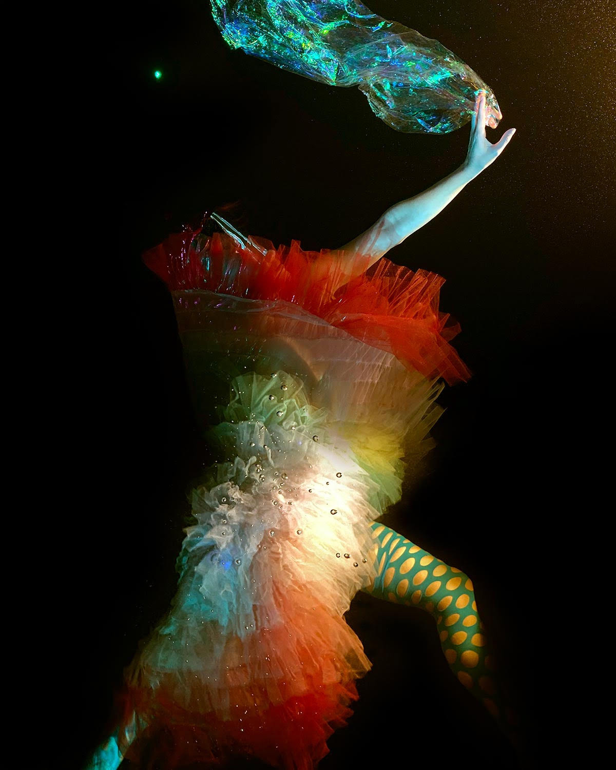 Swirling Fabrics Envelop Floating Subjects in Underwater Photographs by Christy Lee Rogers