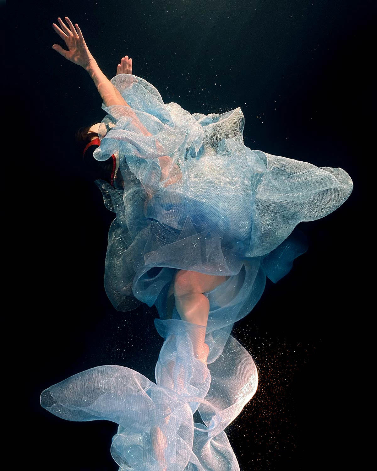 Swirling Fabrics Envelop Floating Subjects in Underwater Photographs by Christy Lee Rogers