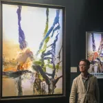 HONG KONG, CHINA - APRIL 02: A visitor walks by a painting by Zao Wou-Ki during Sotheby