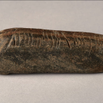 Stone inscribed with ancient ogham writing found in Coventry, England, 2024.