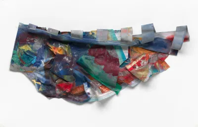 A painting composed of strips of fabric that are placed against one another and hung to a wall.