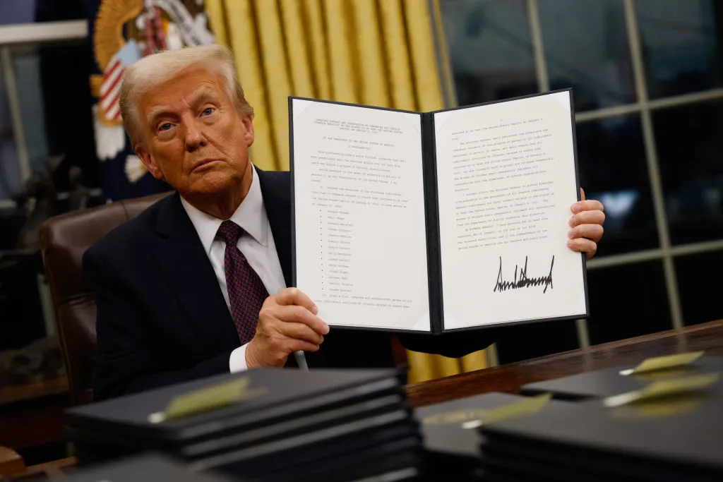 WASHINGTON, DC - JANUARY 20: President Donald Trump signs executive orders in the Oval Office on January 20, 2025 in Washington, DC. Trump takes office for his second term as the 47th president of the United States. (Photo by Anna Moneymaker/Getty Images)