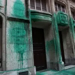 A photo shows green paint thrown on the walls of the Agoudas Hakehilos synagogue in Paris on May 31, 2025. The Shoah Memorial, two synagogues, and a restaurant in central Paris were sprayed with green paint overnight on May 30, 2025, according to police sources. (Photo by Thibaud MORITZ / AFP) (Photo by THIBAUD MORITZ/AFP via Getty Images)