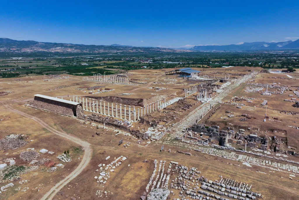 DENIZLI, TURKIYE - MAY 27: An aerial view of the Laodikeia Ancient City, which is on the UNESCO World Heritage Temporary List, where the annual number of tourists exceeded 100 thousand for the first time last year, and arouses the curiosity of local and foreign tourists with its finds dating back thousands of years in Denizli, Turkiye on May 27, 2024. The history of the ancient city, which was discovered by European travelers in the 17th century and where scientific excavations began for the first time in 1961, dates back to 5,500 BC. (Photo by Lokman Ilhan/Anadolu via Getty Images)