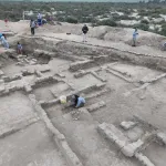 Archaeologists excavating the Moche site of Licapa II