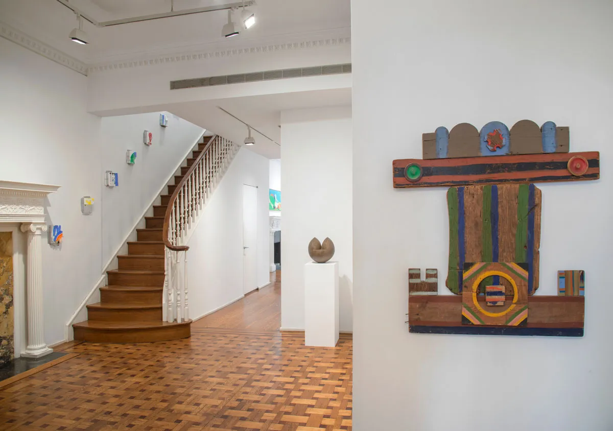 View of an Upper East Side townhouse that has been converted into an art gallery. There are several artworks on view.