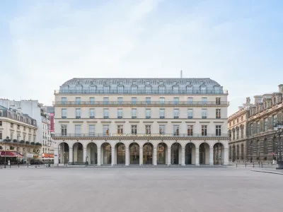 A department store on an empty plaza.