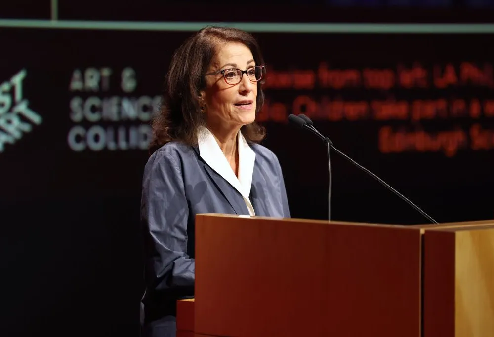 Joan Weinstein speaking at the opening press conference for PST ART:
