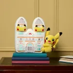A plush Pikacho doll hugs a tiny museum.