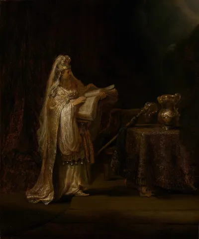 A painting of a man in golden robes holding a big book. Light pours in from one corner.