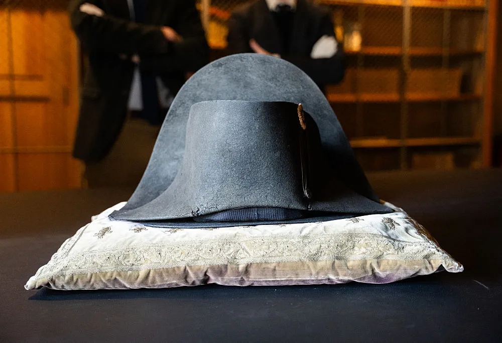 This photograph shows a bicorn hat recently authentified as worn by French Emperor Napoleon Bonaparte during a press preview in the library of the Chateau de Chantilly, northern France, on March 26, 2026. (Photo by Elise HOUBEN / AFP via Getty Images)
