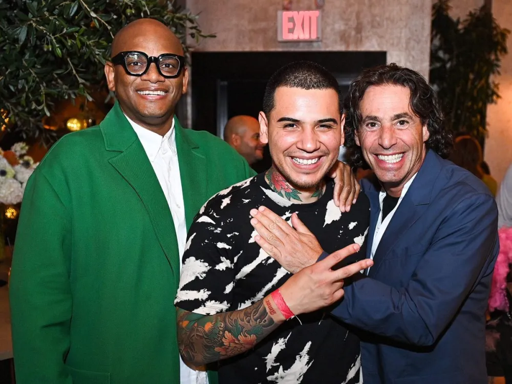 NEW YORK, NEW YORK - SEPTEMBER 06: (L-R) Arthur Lewis, Devon Rodriguez and Adam Leibner attend the after-party for Underground, an immersive pop-up exhibition by portraitist and TikTok sensation Devon Rodriguez, on September 6, 2023, at the Gansevoort Rooftop in New York City. (Photo by Roy Rochlin/Getty Images for United Talent Agency)