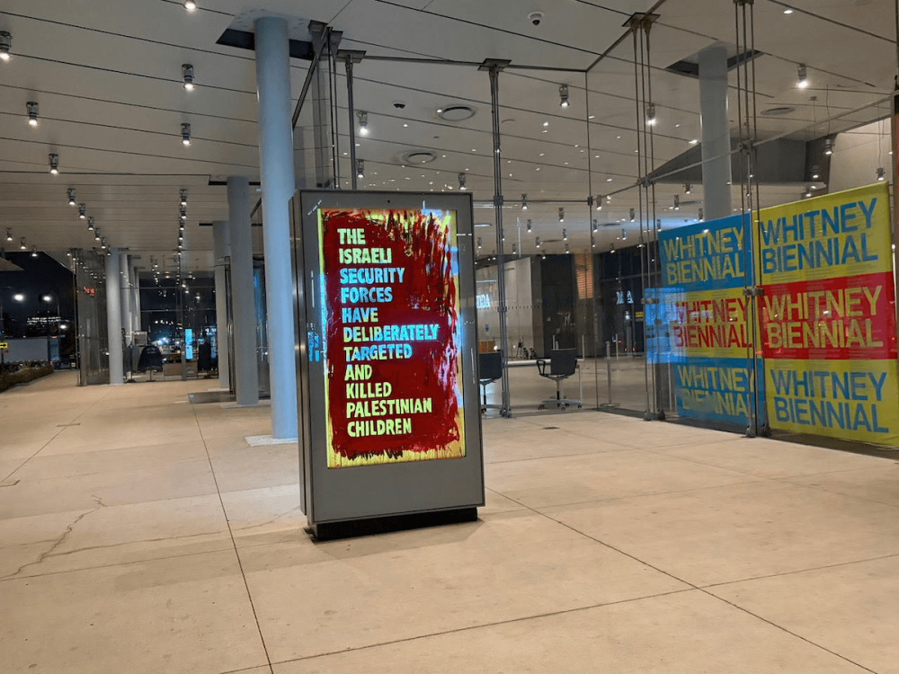 A light-up display that has been covered with text reading