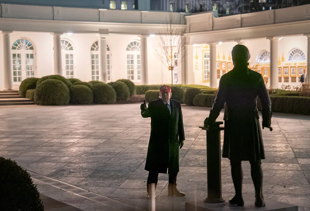 WASHINGTON, DC - MARCH 1: U.S. President Donald Trump examines a new statue of Thomas Jefferson in the Rose Garden after returning to the White House on Sunday, March 1, 2026 in Washington, D.C. Trump ordered strikes against Iran while spending the weekend at his Mar-a-Lago resort in Florida. (Photo by Peter W. Stevenson/The Washington Post via Getty Images)