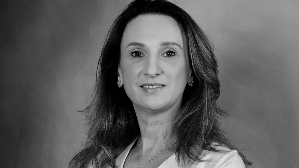 A portrait of a woman in black and white.