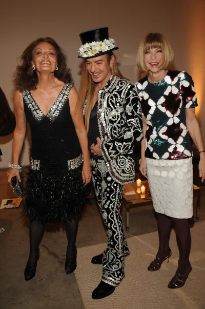 (L-R) Diane von Furstenberg, John Galliano and Anna Wintour attend the 2008 CFDA/Vogue Fashion Fund Awards. (Photo by Steve Eichner/WWD/Penske Media via Getty Images)