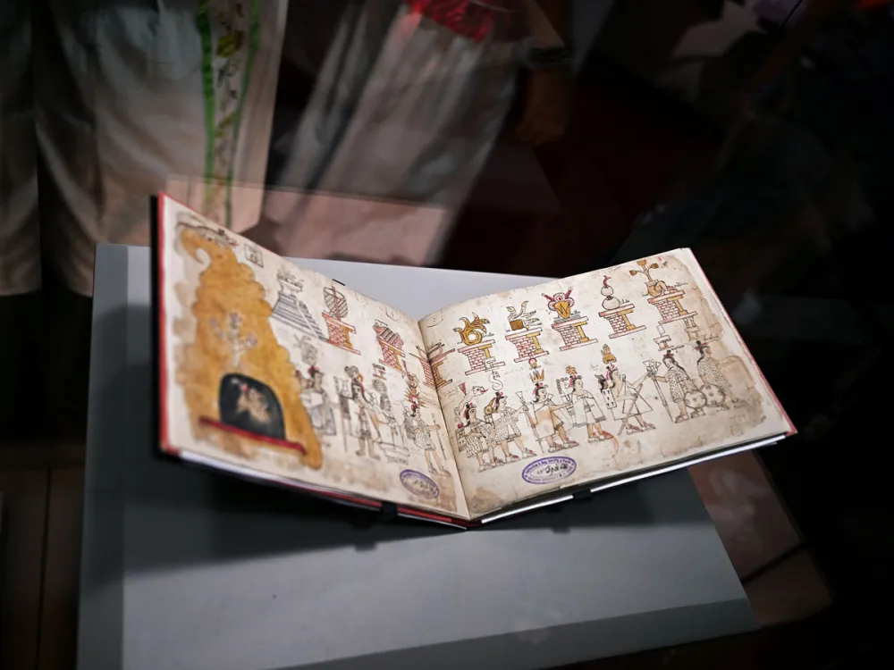 The Azcatitlan Codex, an ancient Aztec pictorial manuscript on loan from France, is displayed at the National Museum of Anthropology in Mexico City on September 17, 2026. A cherished 16th-century Mexican manuscript that tells the history of the Aztecs in pictograms goes on display on September 17 in Mexico City, nearly two centuries after it was whisked off to France. (Photo by Carl de Souza / AFP via Getty Images)