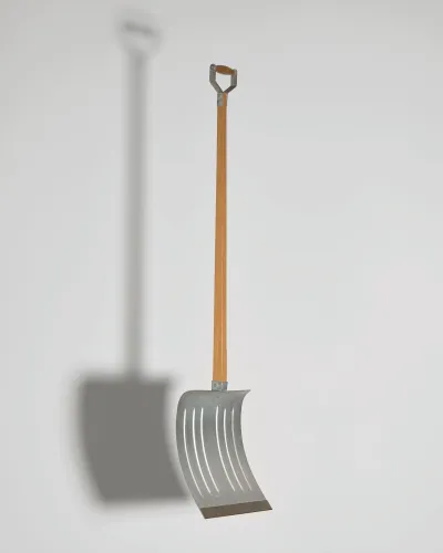 A readymade sculpture of a snow shovel.