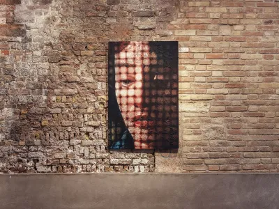 A painting of a man seen behind a gridded shadow hangs on a brick wall.