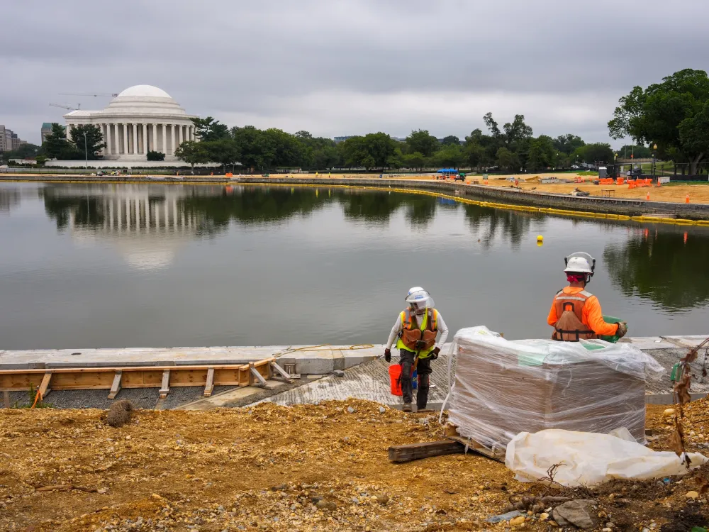 The Jefferson Memorial is visible at an ongoing construction project at the Tidal Basin on August 20, 2025 in Washington, DC.